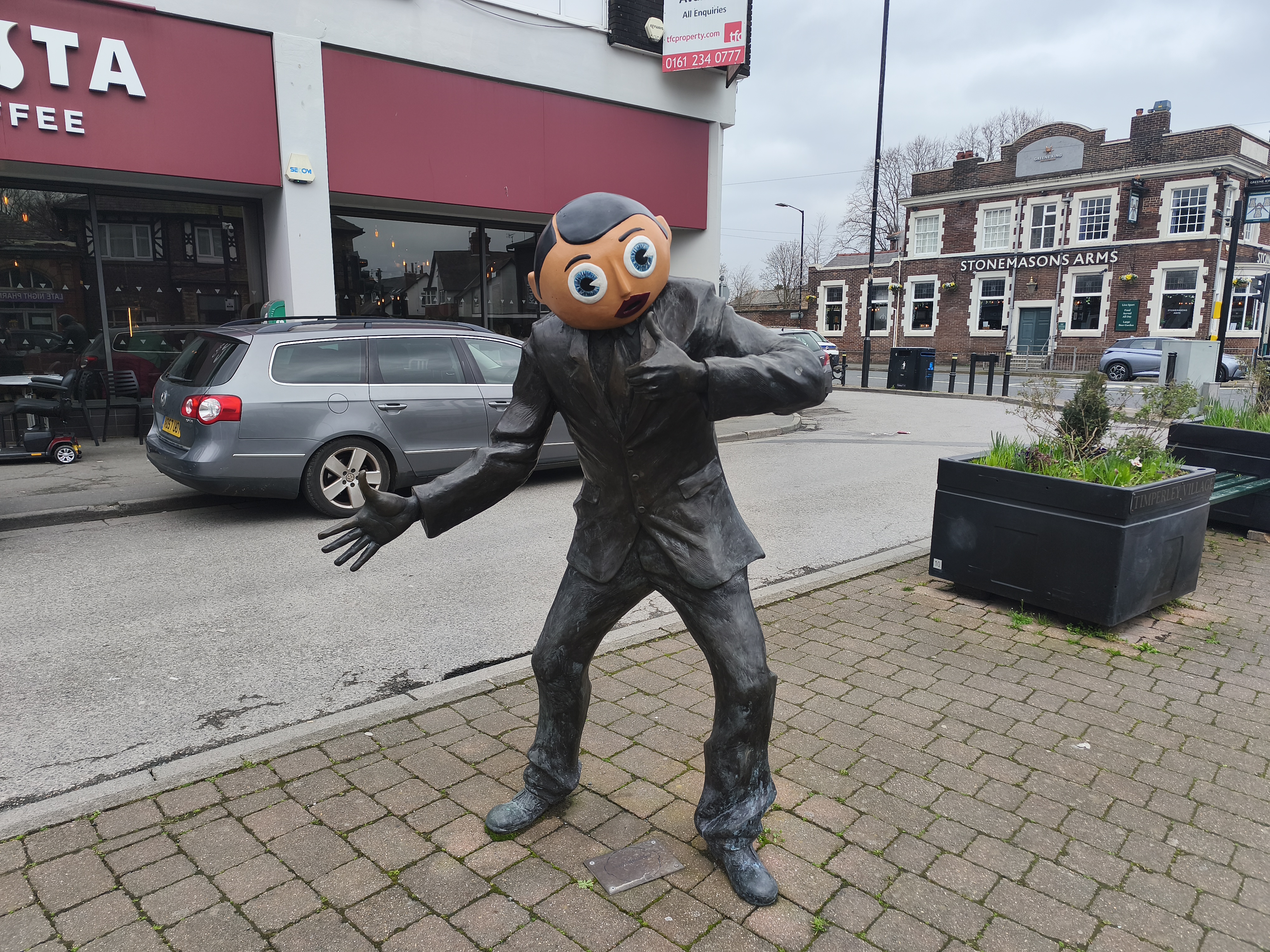 The statue of Frank Sidebottom in Timperley Village (7th March 2026).