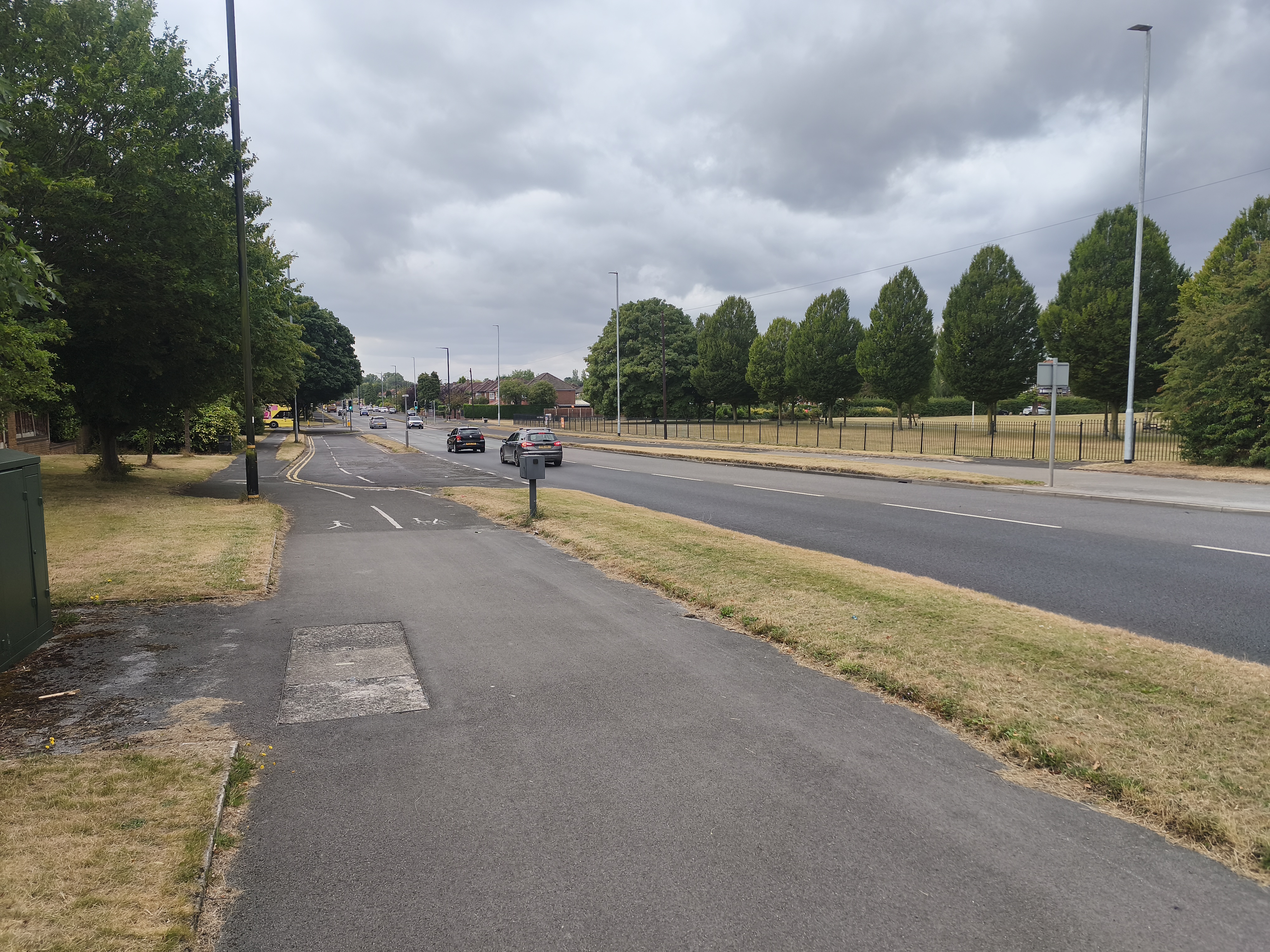 Shaftesbury Avenue as viewed from the eastern side near Brooklands Roundabout, with Timperley Green in view on the right (29th July 2026).
